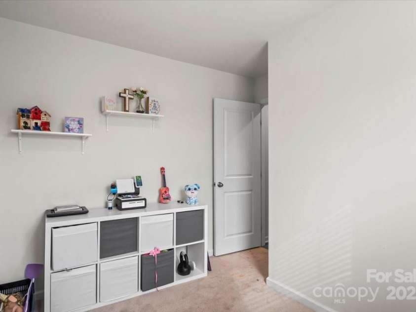 668 Pointe Andrews Drive, Concord, NC 28025.  MLS# CAR4225939, YatesRealty ID 12074. Guest bedroom #1