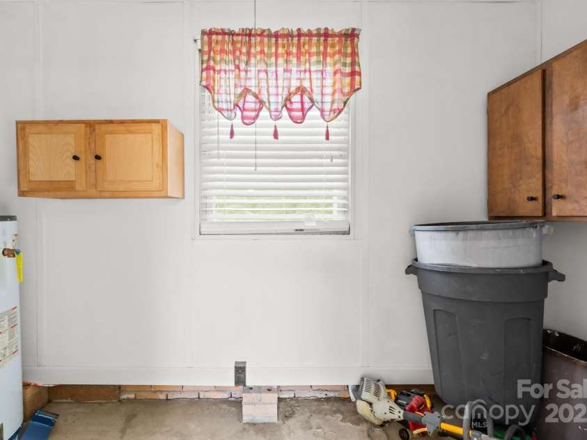 1811 Belmar Drive, Gastonia, NC 28052.  MLS# CAR4253903, YatesRealty ID 12077. Laundry and storage