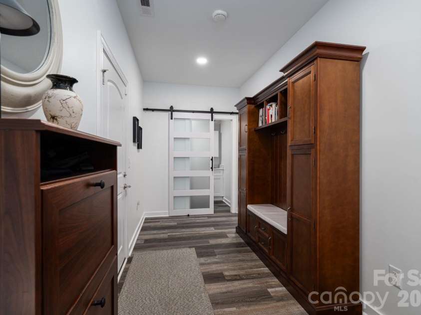 148 Shields Drive, Lincolnton, NC 28092.  MLS# CAR4357341, YatesRealty ID 12083. Hallway to half bath, laundry and garage 