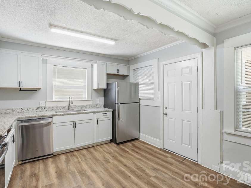 8825 Mcclure Circle, Charlotte, NC 28216.  MLS# CAR4366009, YatesRealty ID 12084. 