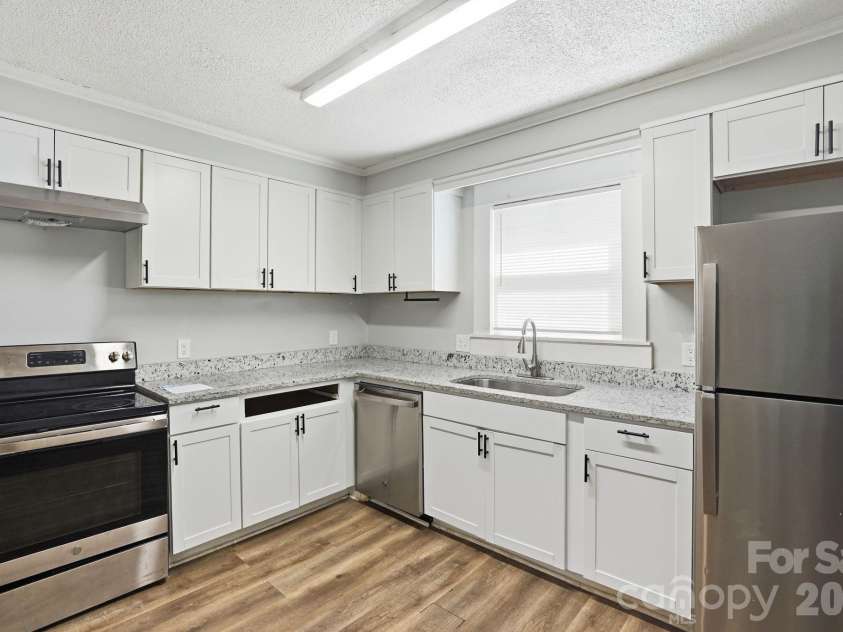 8825 Mcclure Circle, Charlotte, NC 28216.  MLS# CAR4366009, YatesRealty ID 12084. 