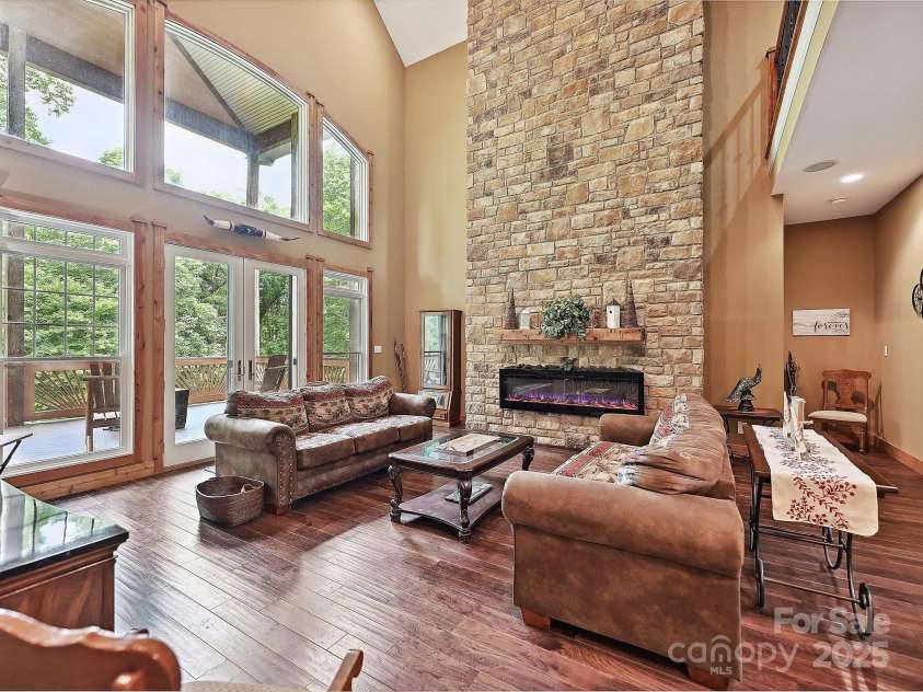 1140 Fern Hill Road, Mooresville, NC 28117.  MLS# CAR4255290, YatesRealty ID 12085. 2 story great room with fireplace and stone accent