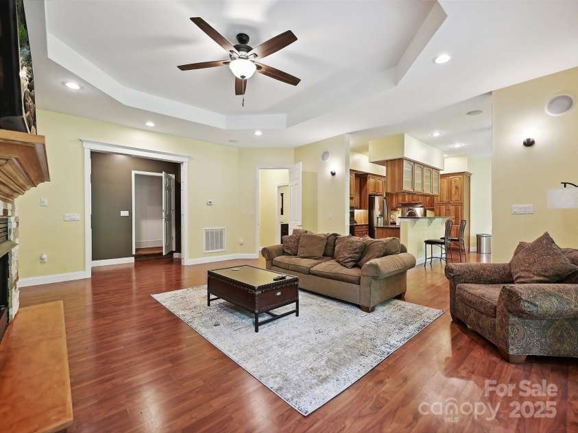 1140 Fern Hill Road, Mooresville, NC 28117.  MLS# CAR4255290, YatesRealty ID 12085. Basement grea room view of full kitchen with appliances