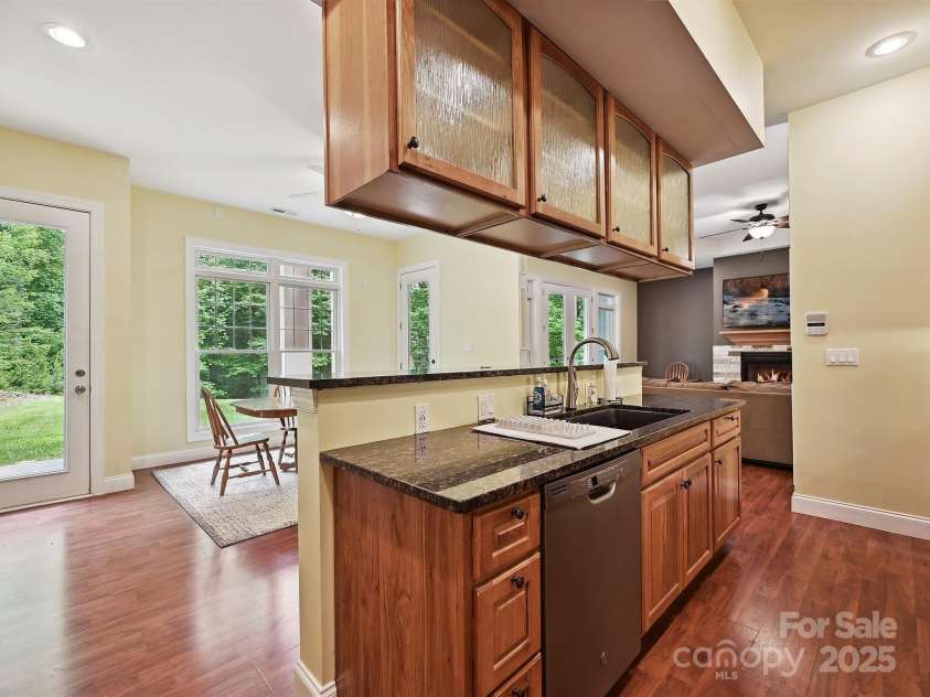 1140 Fern Hill Road, Mooresville, NC 28117.  MLS# CAR4255290, YatesRealty ID 12085. Basement kitchen with granite counters and dishwasher , deep gormet style sink.