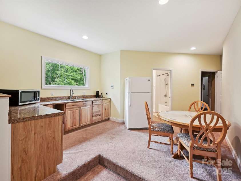 1140 Fern Hill Road, Mooresville, NC 28117.  MLS# CAR4255290, YatesRealty ID 12085. Bonus room wet bar open to large entertainment area with lots of room