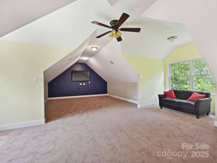 1140 Fern Hill Road, Mooresville, NC 28117.  MLS# CAR4255290, YatesRealty ID 12085. Bonus room with wall mounted TV viewing area