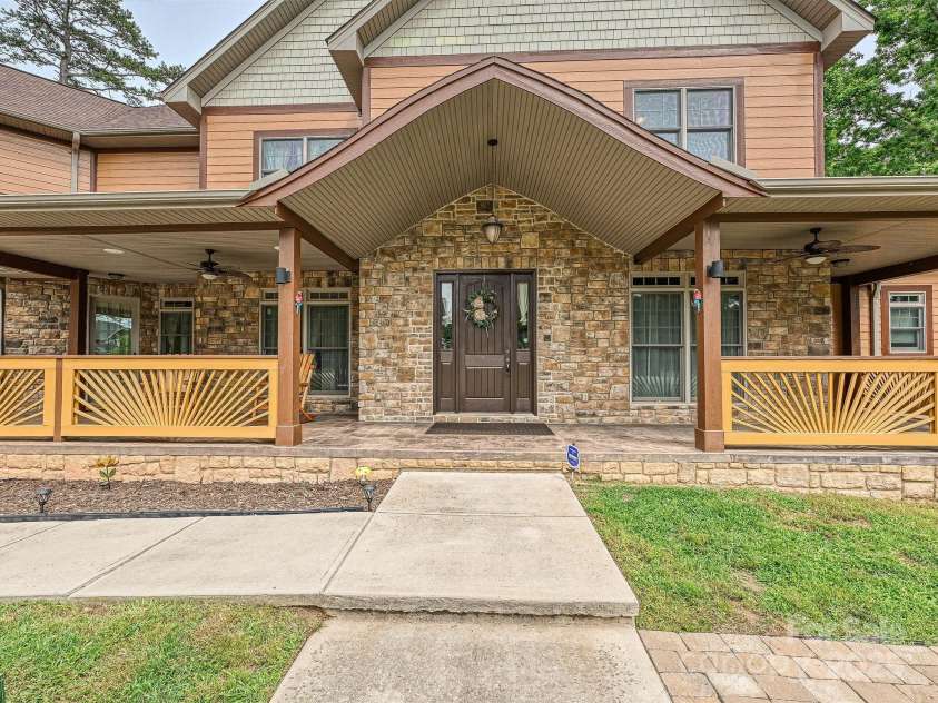 1140 Fern Hill Road, Mooresville, NC 28117.  MLS# CAR4255290, YatesRealty ID 12085. Covered front porch welcomes guests.