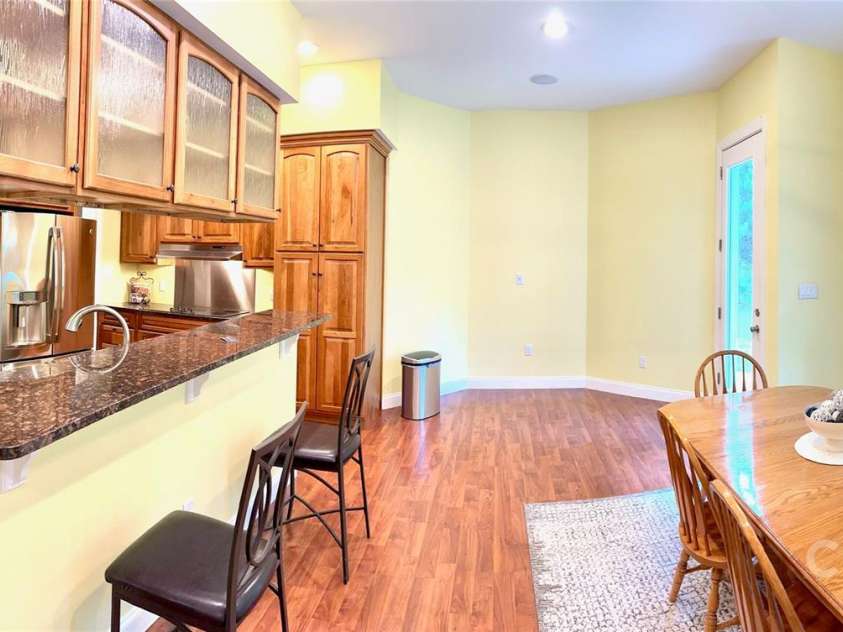 1140 Fern Hill Road, Mooresville, NC 28117.  MLS# CAR4255290, YatesRealty ID 12085. Spacious basement kitchen