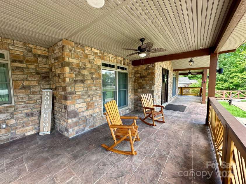 1140 Fern Hill Road, Mooresville, NC 28117.  MLS# CAR4255290, YatesRealty ID 12085. Wide porch with plenty of room for chairs and relaxation