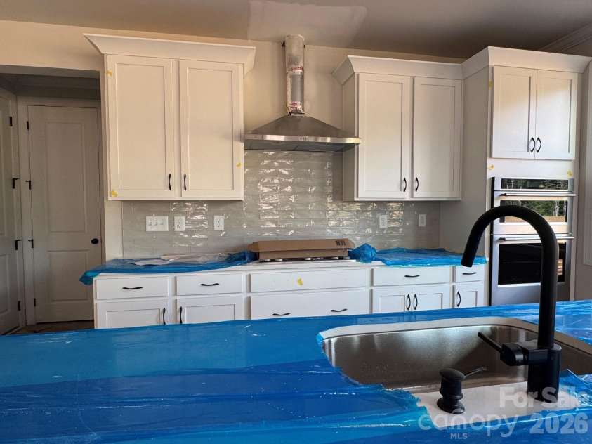 2549 Mabel Lane, Monroe, NC 28110.  MLS# CAR4365854, YatesRealty ID 12088. Kitchen in Progress