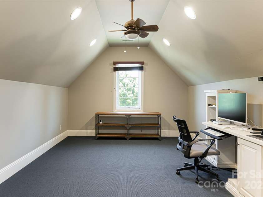 2005 Viburnum Lane, Asheville, NC 28803.  MLS# CAR4151623, YatesRealty ID 12090. Bonus Room, office, playroom with additional storage.