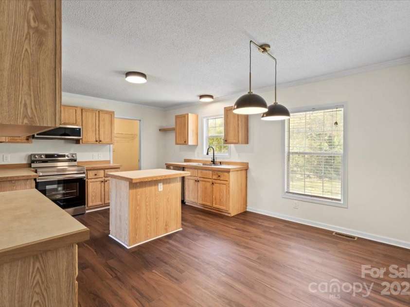 1058 Canada Drive, Dallas, NC 28034.  MLS# CAR4244603, YatesRealty ID 12091. 