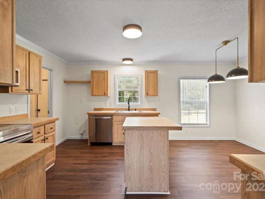 1058 Canada Drive, Dallas, NC 28034.  MLS# CAR4244603, YatesRealty ID 12091. 