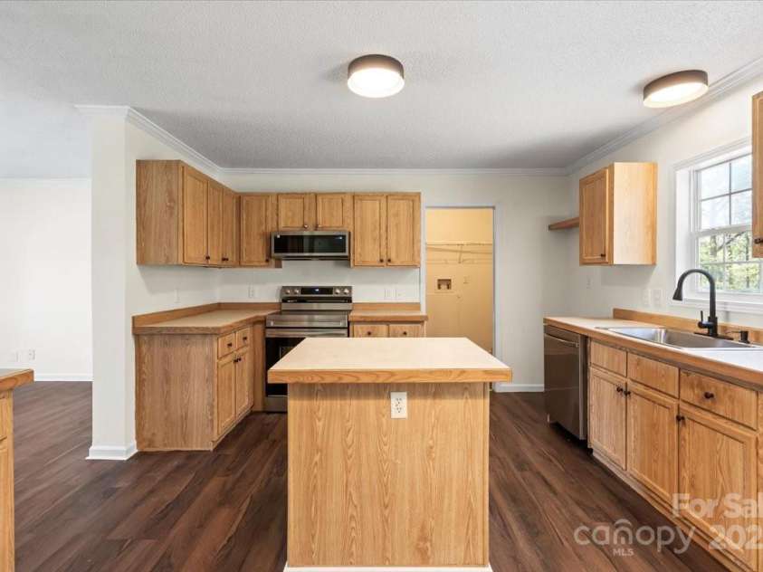 1058 Canada Drive, Dallas, NC 28034.  MLS# CAR4244603, YatesRealty ID 12091. 