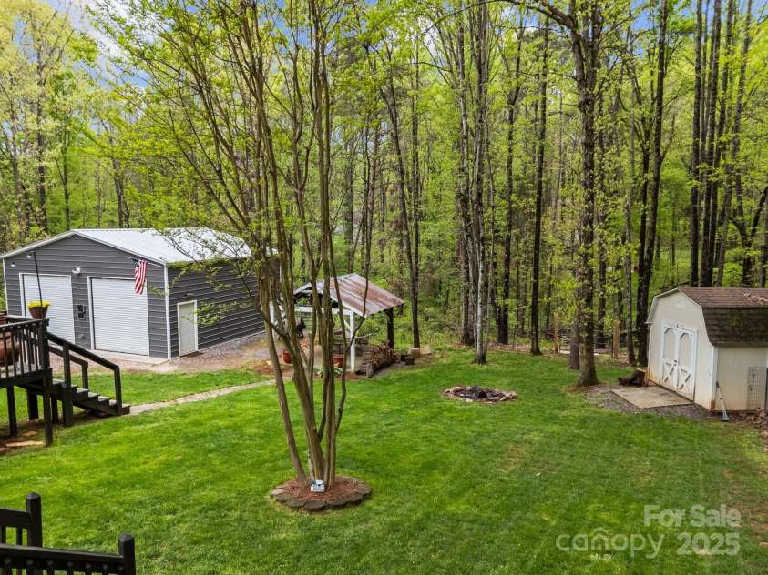 214 Creek View Road, Mooresville, NC 28117.  MLS# CAR4243602, YatesRealty ID 12099. Beautiful Backyard! Even the shed has power!