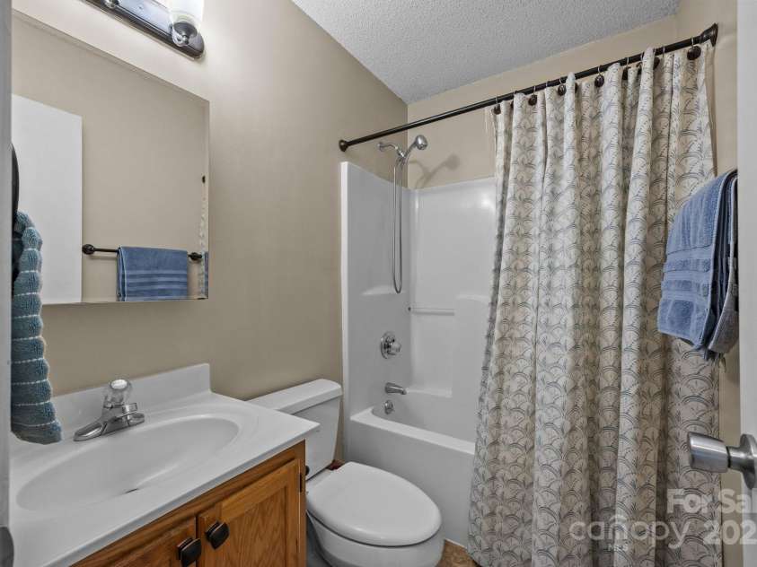 214 Creek View Road, Mooresville, NC 28117.  MLS# CAR4243602, YatesRealty ID 12099. Hall Bathroom