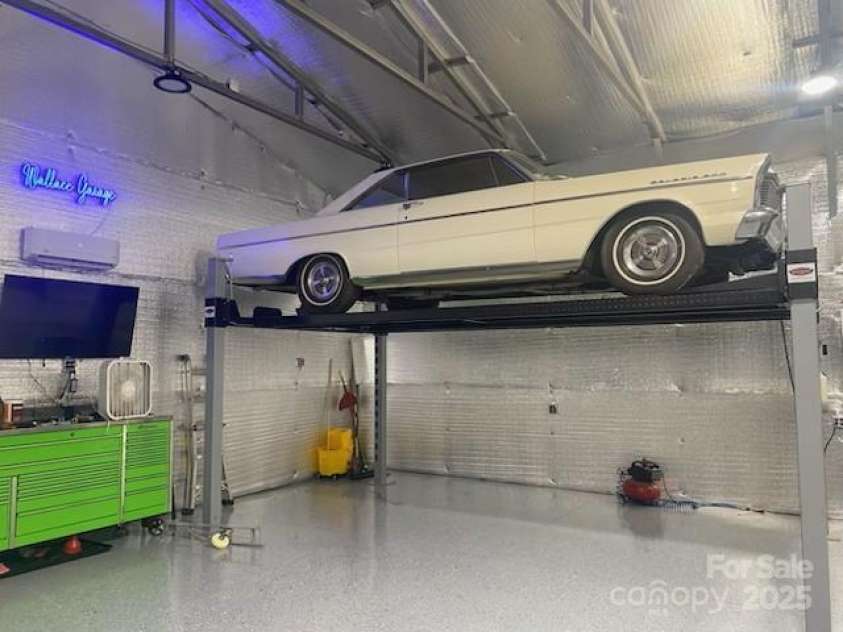 214 Creek View Road, Mooresville, NC 28117.  MLS# CAR4243602, YatesRealty ID 12099. Interior of Garage - willing to sell Wildfire XLT Lift, TV/Mount conveys