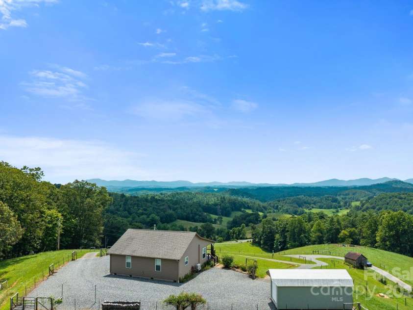 1045 & 1047 Graham Road, Marshall, NC 28753.  MLS# CAR4280943, YatesRealty ID 121. Circular drive and level parking