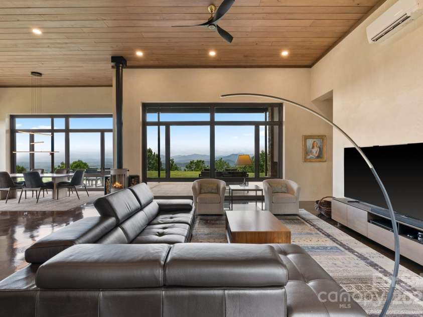 1045 & 1047 Graham Road, Marshall, NC 28753.  MLS# CAR4280943, YatesRealty ID 121. Common areas are open with a 3 directional view