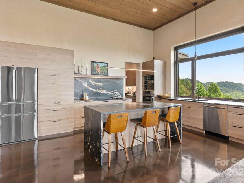 1045 & 1047 Graham Road, Marshall, NC 28753.  MLS# CAR4280943, YatesRealty ID 121. Gourmet kitchen w/custom cabinetry and granite counters