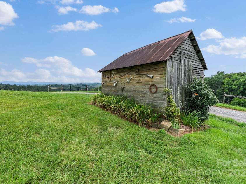 1045 & 1047 Graham Road, Marshall, NC 28753.  MLS# CAR4280943, YatesRealty ID 121. Original corn crib