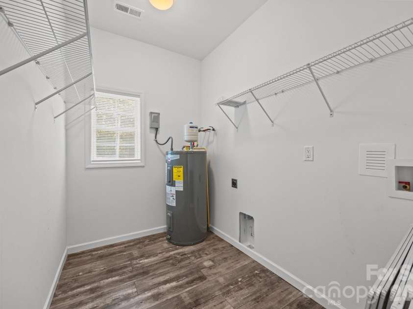 14532 Rocky River Road, Davidson, NC 28036.  MLS# CAR4370083, YatesRealty ID 12100. Large laundry room. 