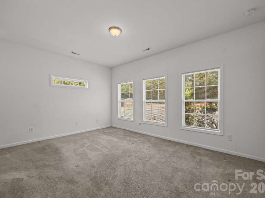 14532 Rocky River Road, Davidson, NC 28036.  MLS# CAR4370083, YatesRealty ID 12100. Primary bedroom