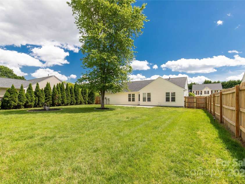 9916 Meadowmead Court, Charlotte, NC 28273.  MLS# CAR4251575, YatesRealty ID 12102. Privacy fence surrounding property