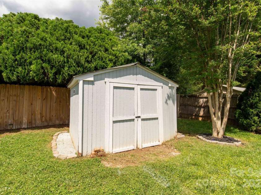 9916 Meadowmead Court, Charlotte, NC 28273.  MLS# CAR4251575, YatesRealty ID 12102. Shed with brand new interior flooring