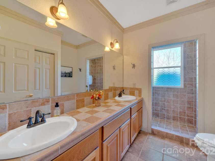 246 Pinnacle Mountain Road, Zirconia, NC 28790.  MLS# CAR4249618, YatesRealty ID 12104. 3rd Bathroom, located on the lower level