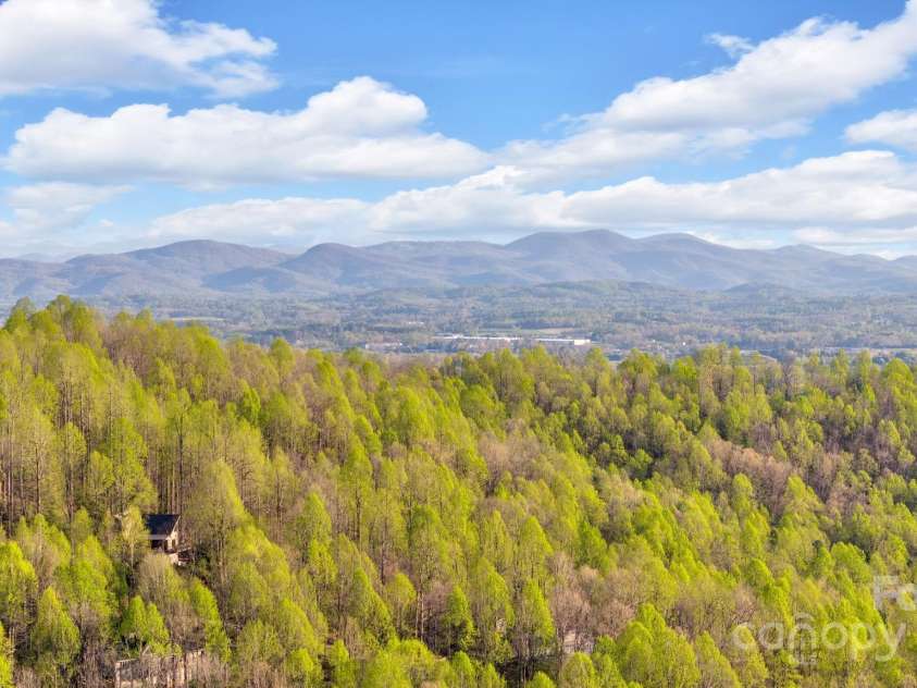 246 Pinnacle Mountain Road, Zirconia, NC 28790.  MLS# CAR4249618, YatesRealty ID 12104. Breathtaking long Range Mountain Views