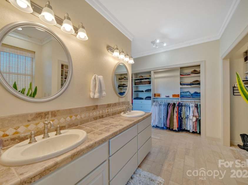 246 Pinnacle Mountain Road, Zirconia, NC 28790.  MLS# CAR4249618, YatesRealty ID 12104. Double vaniety sinks and spacious primary closets