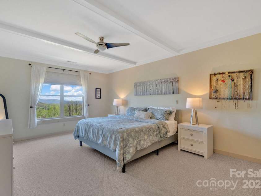 246 Pinnacle Mountain Road, Zirconia, NC 28790.  MLS# CAR4249618, YatesRealty ID 12104. Even the primary bedroom has views & is located on the main level