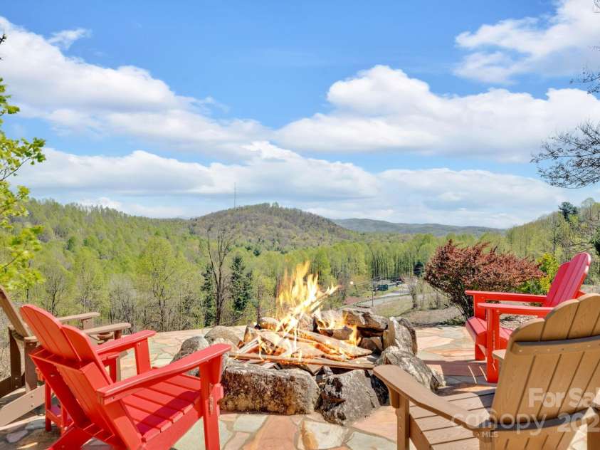 246 Pinnacle Mountain Road, Zirconia, NC 28790.  MLS# CAR4249618, YatesRealty ID 12104. Firepit even offers spectacular views!