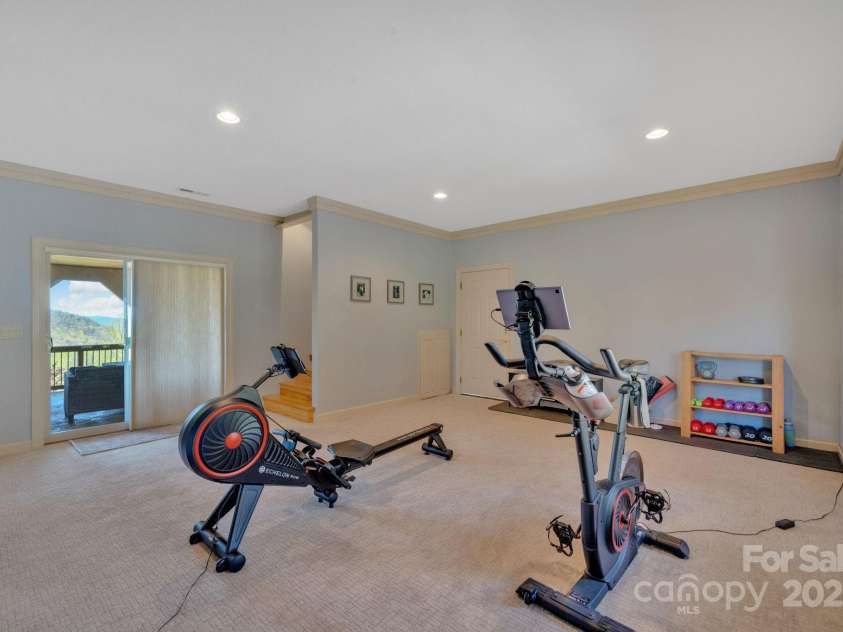 246 Pinnacle Mountain Road, Zirconia, NC 28790.  MLS# CAR4249618, YatesRealty ID 12104. Spacious Family Room on the lower level