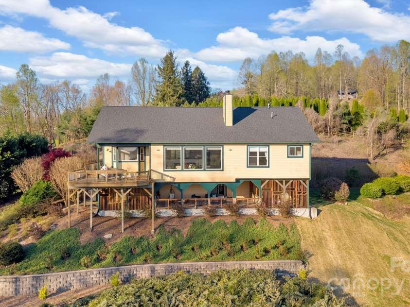 246 Pinnacle Mountain Road, Zirconia, NC 28790.  MLS# CAR4249618, YatesRealty ID 12104. View from the back of the home and what you see driving up Pinnacle Mountain