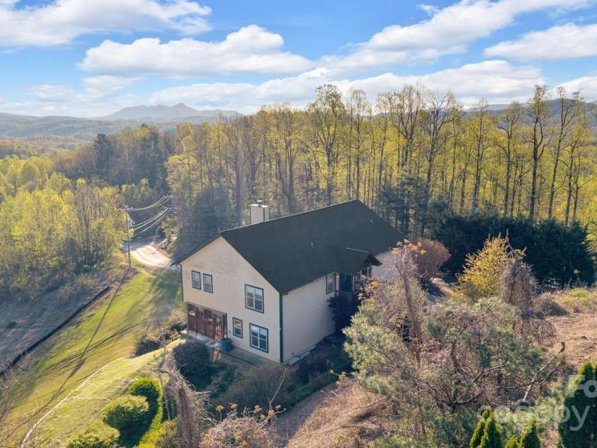 246 Pinnacle Mountain Road, Zirconia, NC 28790.  MLS# CAR4249618, YatesRealty ID 12104. View looking NW toward Pinnacle Mountain Rd.