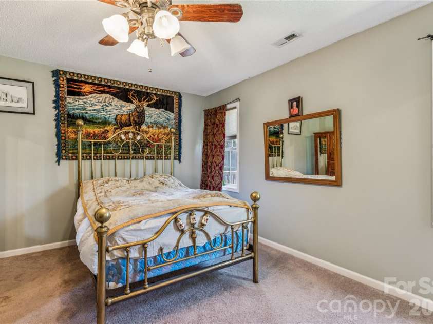 4 Miss Julia Way, Granite Falls, NC 28630.  MLS# CAR4369022, YatesRealty ID 12104. Primary Suite