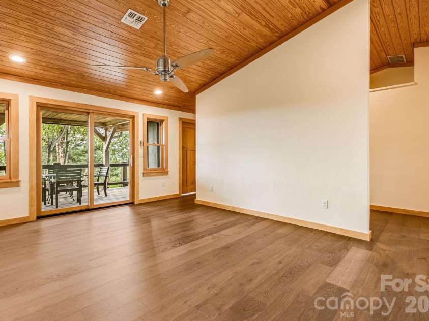 55 Glade Lane, Black Mountain, NC 28711.  MLS# CAR4369029, YatesRealty ID 12105. Vaulted Wood Covered Ceilings in Primary
