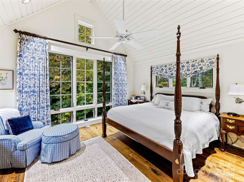 616 Old Growth Forest Road, Burnsville, NC 28714.  MLS# CAR4076276, YatesRealty ID 12106. Ensuite Guest bedroom 2 of 3 on this floor with views of the English Garden and old growth forest