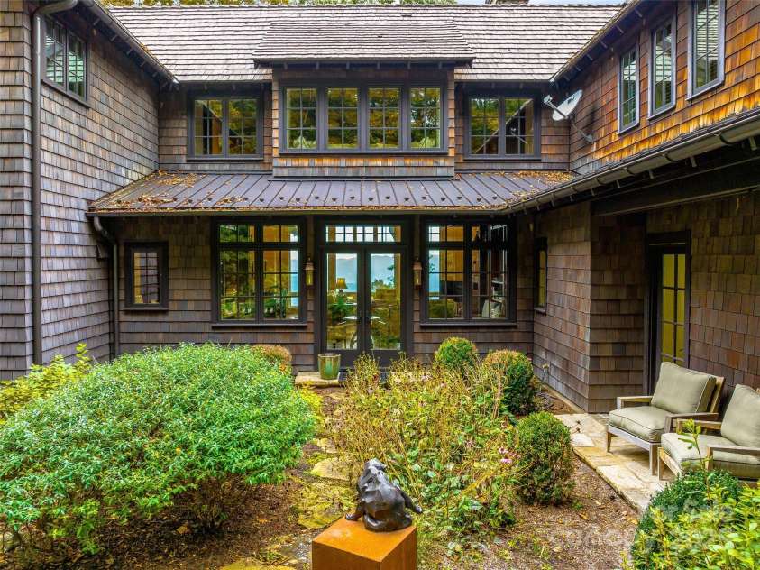 616 Old Growth Forest Road, Burnsville, NC 28714.  MLS# CAR4076276, YatesRealty ID 12106. ...you will be amidst your English Garden!