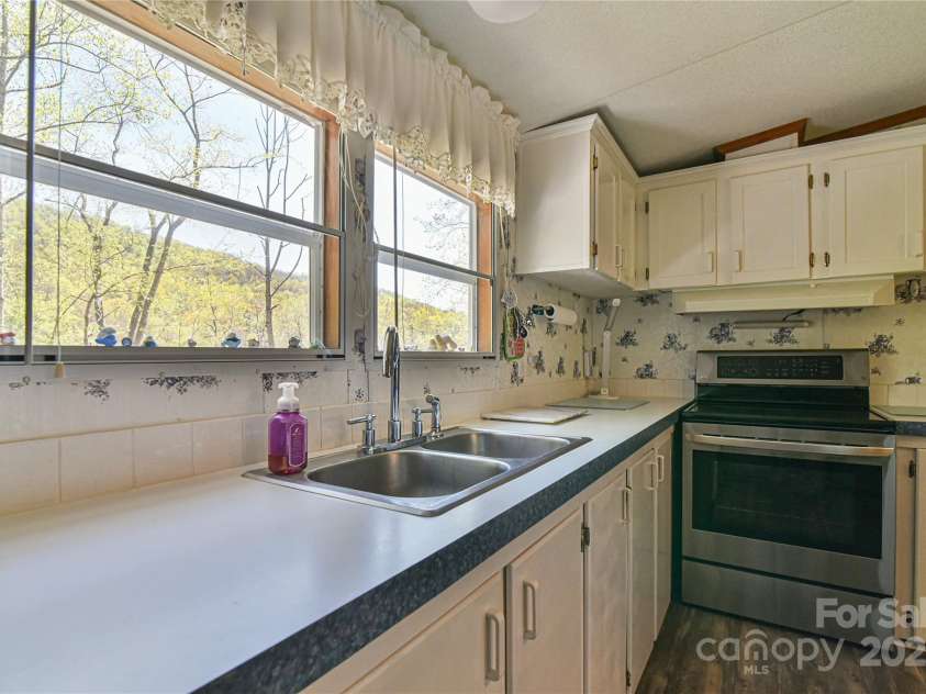 1707 Honeycutt Road, Marion, NC 28752.  MLS# CAR4228547, YatesRealty ID 12107. 