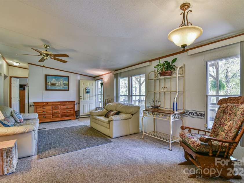 1707 Honeycutt Road, Marion, NC 28752.  MLS# CAR4228547, YatesRealty ID 12107. Large secondary living room dining area