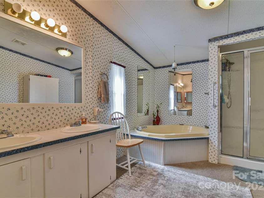 1707 Honeycutt Road, Marion, NC 28752.  MLS# CAR4228547, YatesRealty ID 12107. Primary Bathroom.