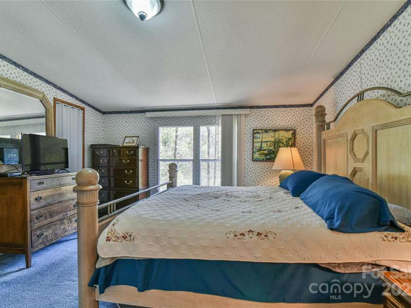 1707 Honeycutt Road, Marion, NC 28752.  MLS# CAR4228547, YatesRealty ID 12107. Primary bedroom