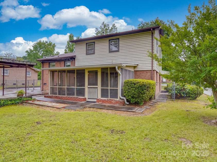 2213 Milton Road, Charlotte, NC 28215.  MLS# CAR4255190, YatesRealty ID 12108. Rear view reflects the well-maintained condition of the home