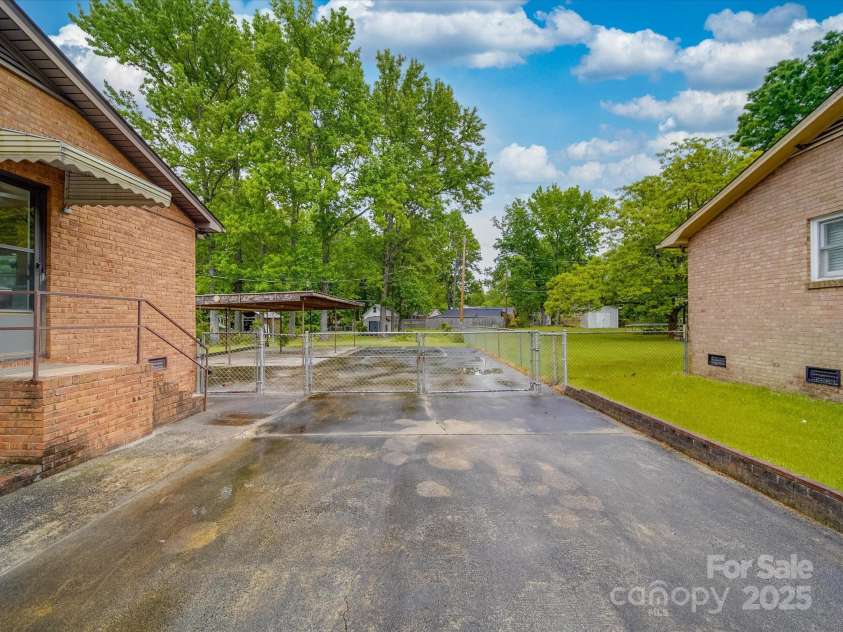 2213 Milton Road, Charlotte, NC 28215.  MLS# CAR4255190, YatesRealty ID 12108. The rear can be closed up with locking gate or left open at your choosing
