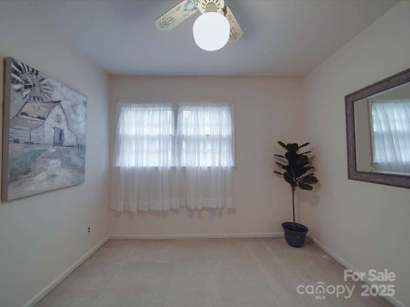 2213 Milton Road, Charlotte, NC 28215.  MLS# CAR4255190, YatesRealty ID 12108. The second of two addtional bedrooms on upper level