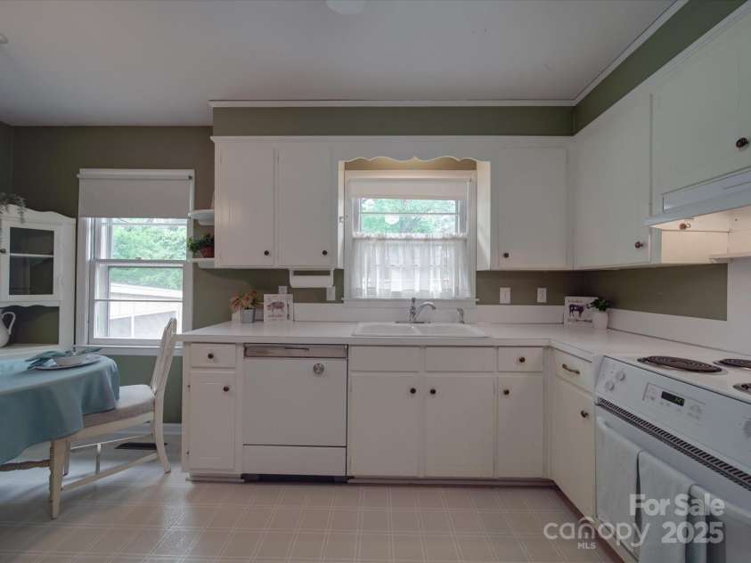 2213 Milton Road, Charlotte, NC 28215.  MLS# CAR4255190, YatesRealty ID 12108. This view includes a 1965 vintage dishwasher that still works today!