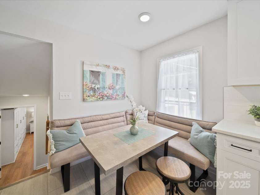 2213 Milton Road, Charlotte, NC 28215.  MLS# CAR4326281, YatesRealty ID 12108. A cozy corner easily seats 6 for in kitchen dining